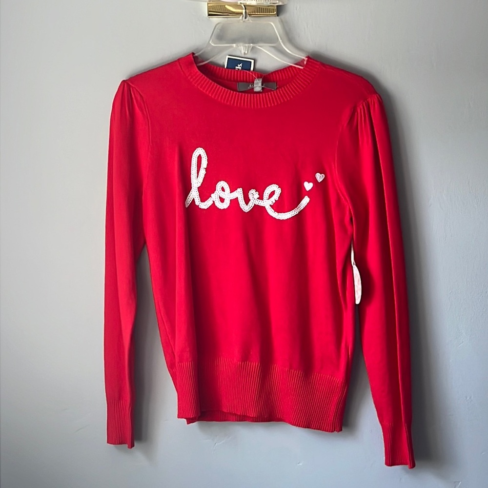 Red long sleeve tee that says love